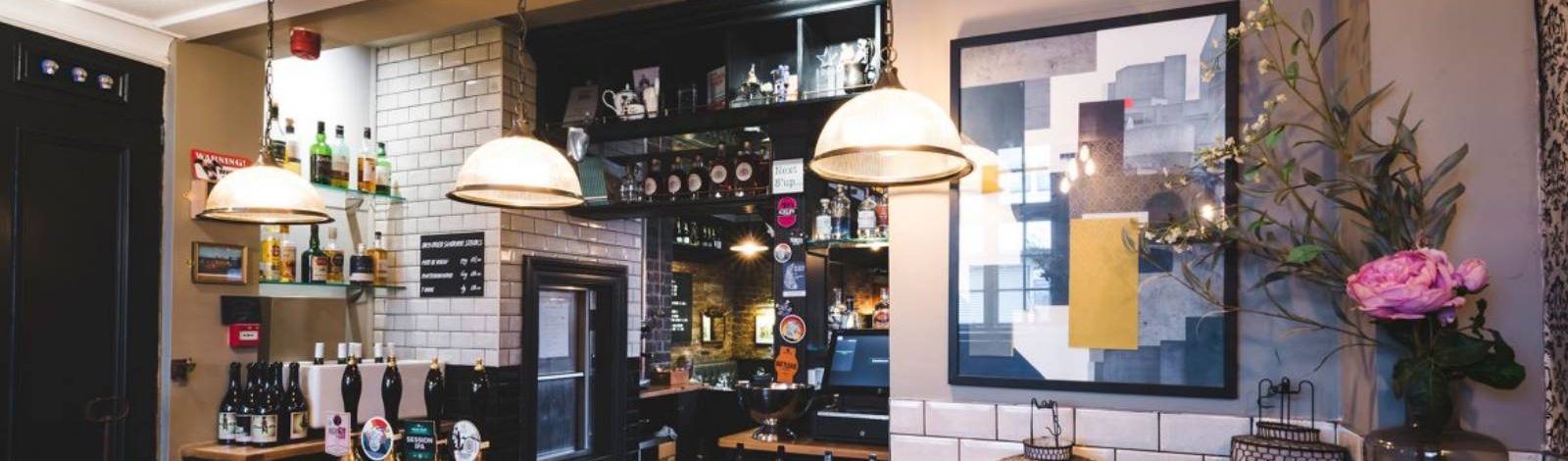 Cozy pub bar with warm lighting