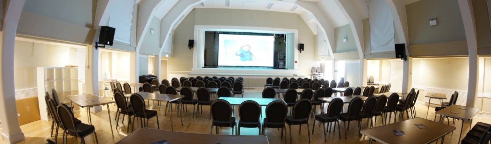 Conference room with chairs and projector screen