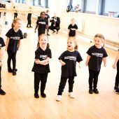 Children laughing in dance class