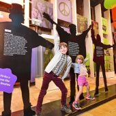 Kids posing with Beatles silhouettes