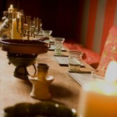 Rustic table with candles and dishes