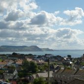 Coastal village with cloudy sky