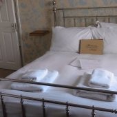 Cozy hotel room with elegant bed