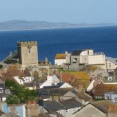 Coastal town with church and sea view