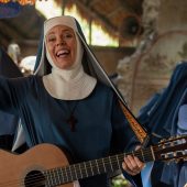 Nuns playing music joyfully with instruments