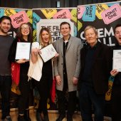Group with awards at Cinema For All event