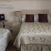 Hotel room with double and single beds