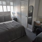Cozy bedroom with gray bedding