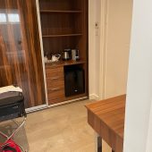 Hotel room with wardrobe and travel luggage