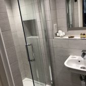 Modern bathroom with glass shower enclosure