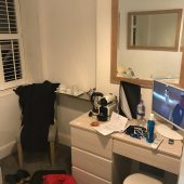 Compact hotel room desk setup