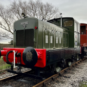 Vintage train on rural railway tracks