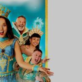 Colorful cast in festive, theatrical costumes