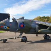 Military jet on display outdoors