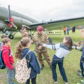 Kids learning about WWII aircraft